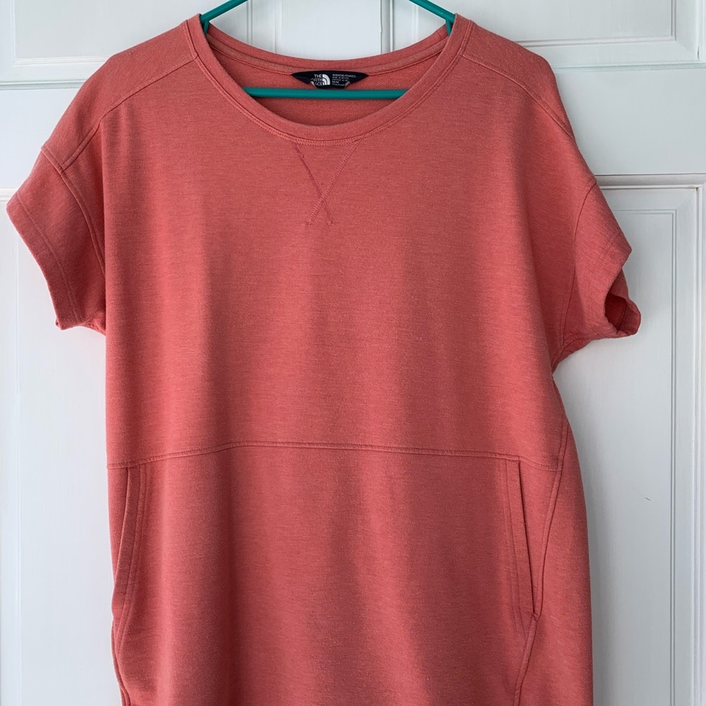 Woman’s North Face Short Sleeve Top size Medium Peach color